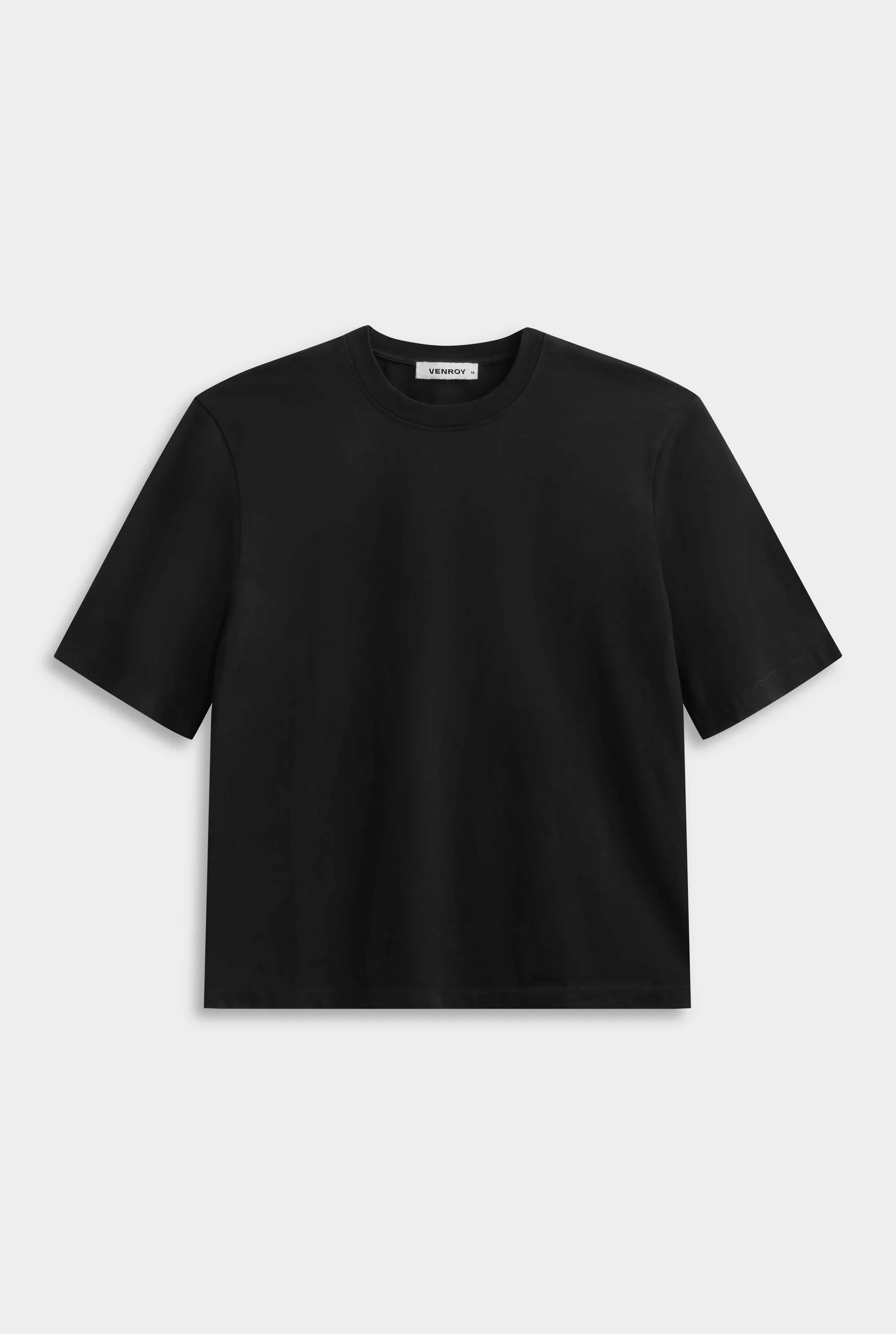 Black oversized T-shirt for a restrained coastal wardrobe